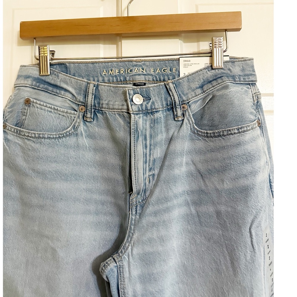 American Eagle Low Rise Ultra Wide Leg Light Aglow Strigid Jeans Jeans NWT Sz 2 - Picture 7 of 9